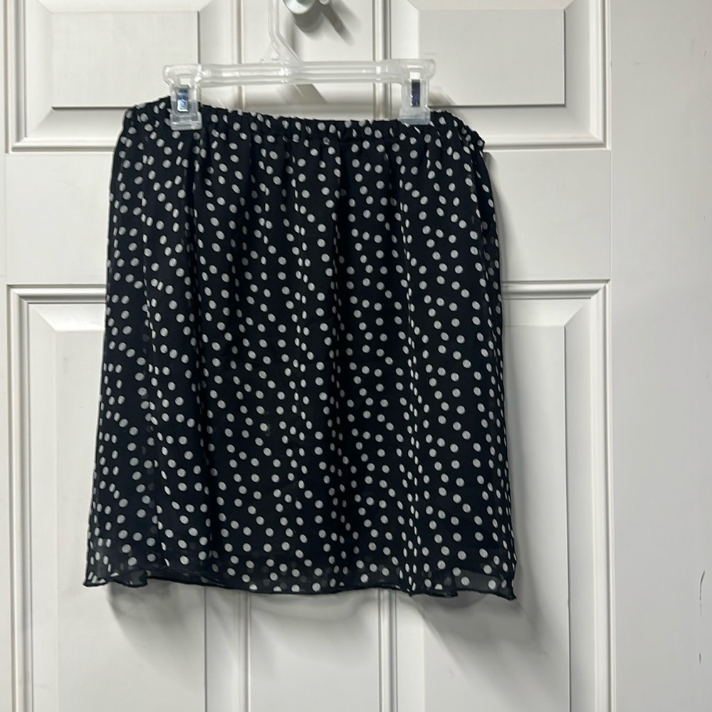 Large black with white polka dot mini skirt